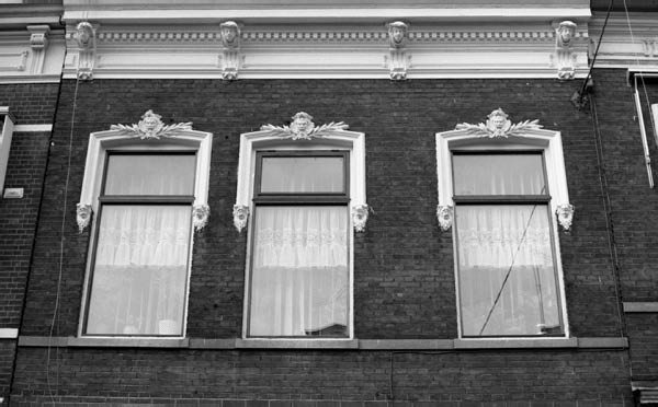 ornament raamomlijsting met kopjes adres onbekend